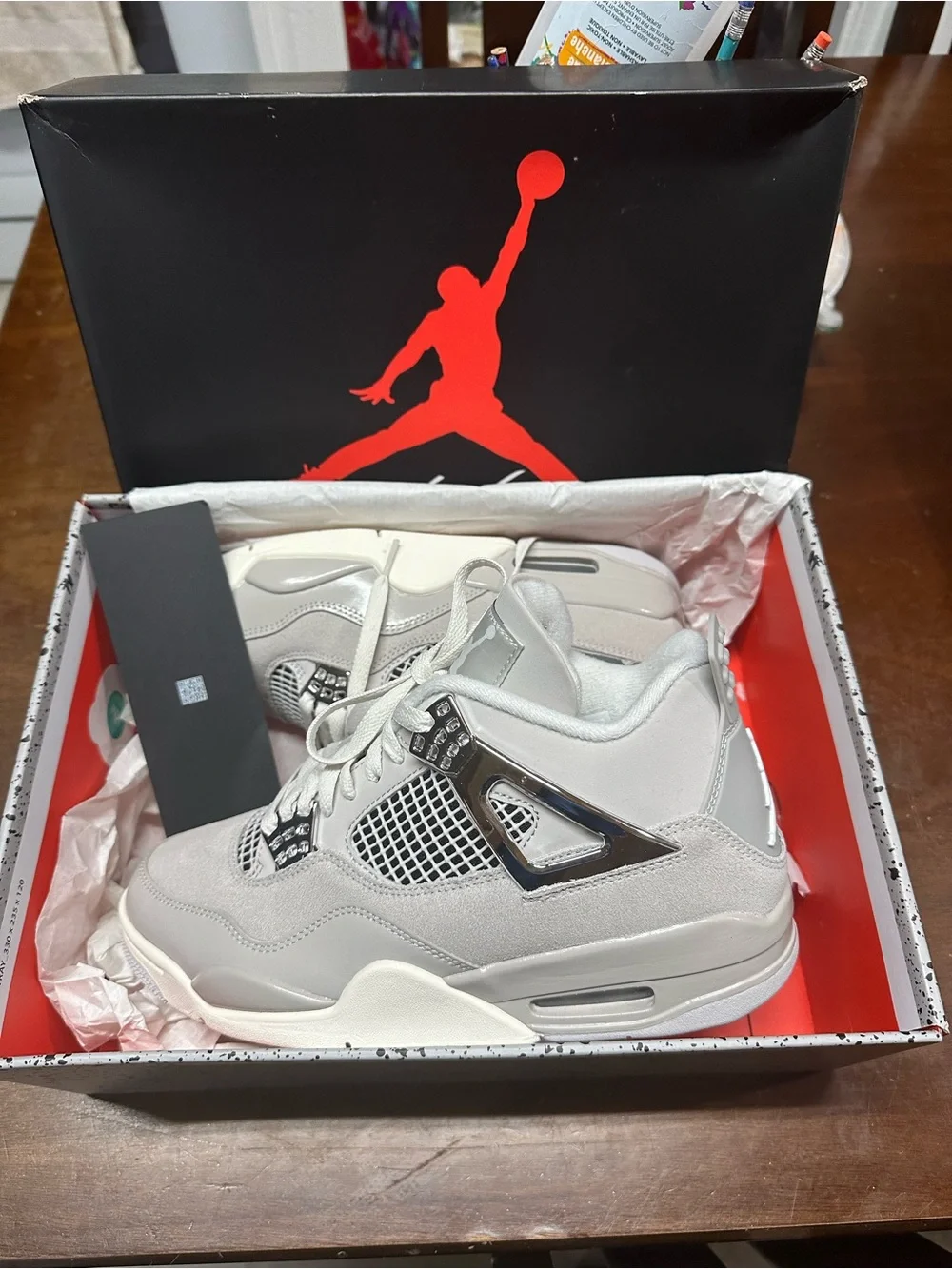 Jordan Men’s Retro 4 Sneakers in Light Grey and White